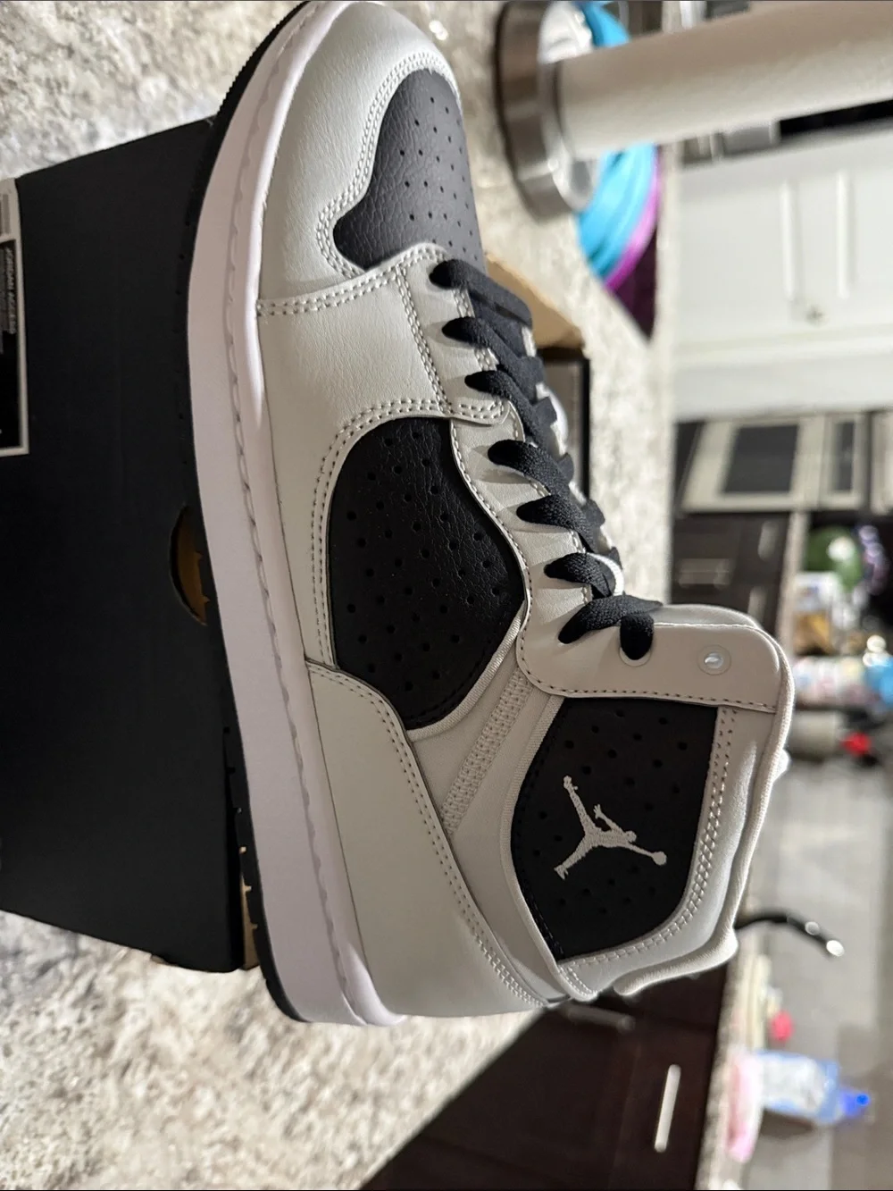 Jordan Black and White Mid-Top Basketball Sneakers